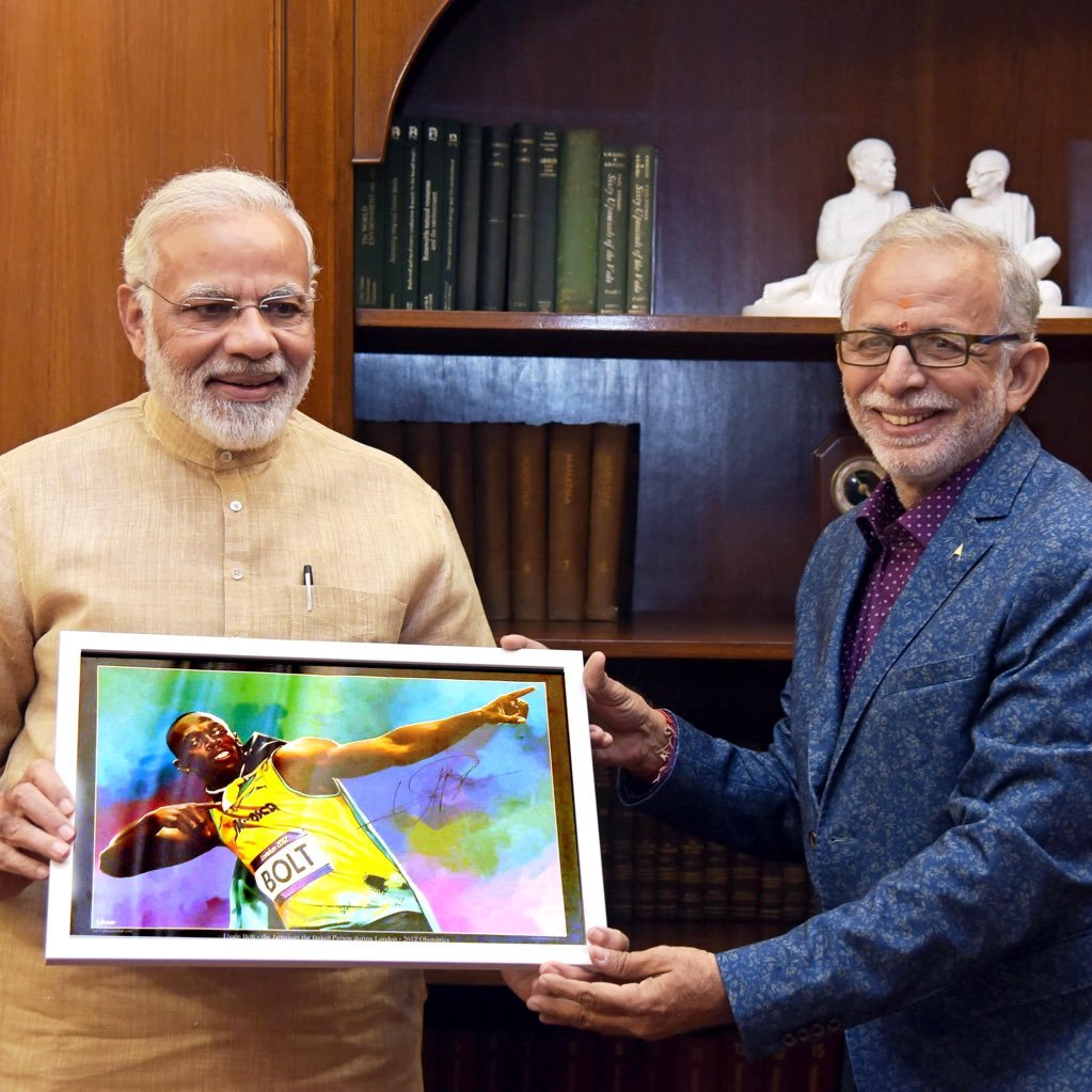 S Sukumar with modi ji, Sport photography