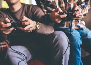 Why Men Retreat to Sports and Tech to Escape the Chaos of Life?